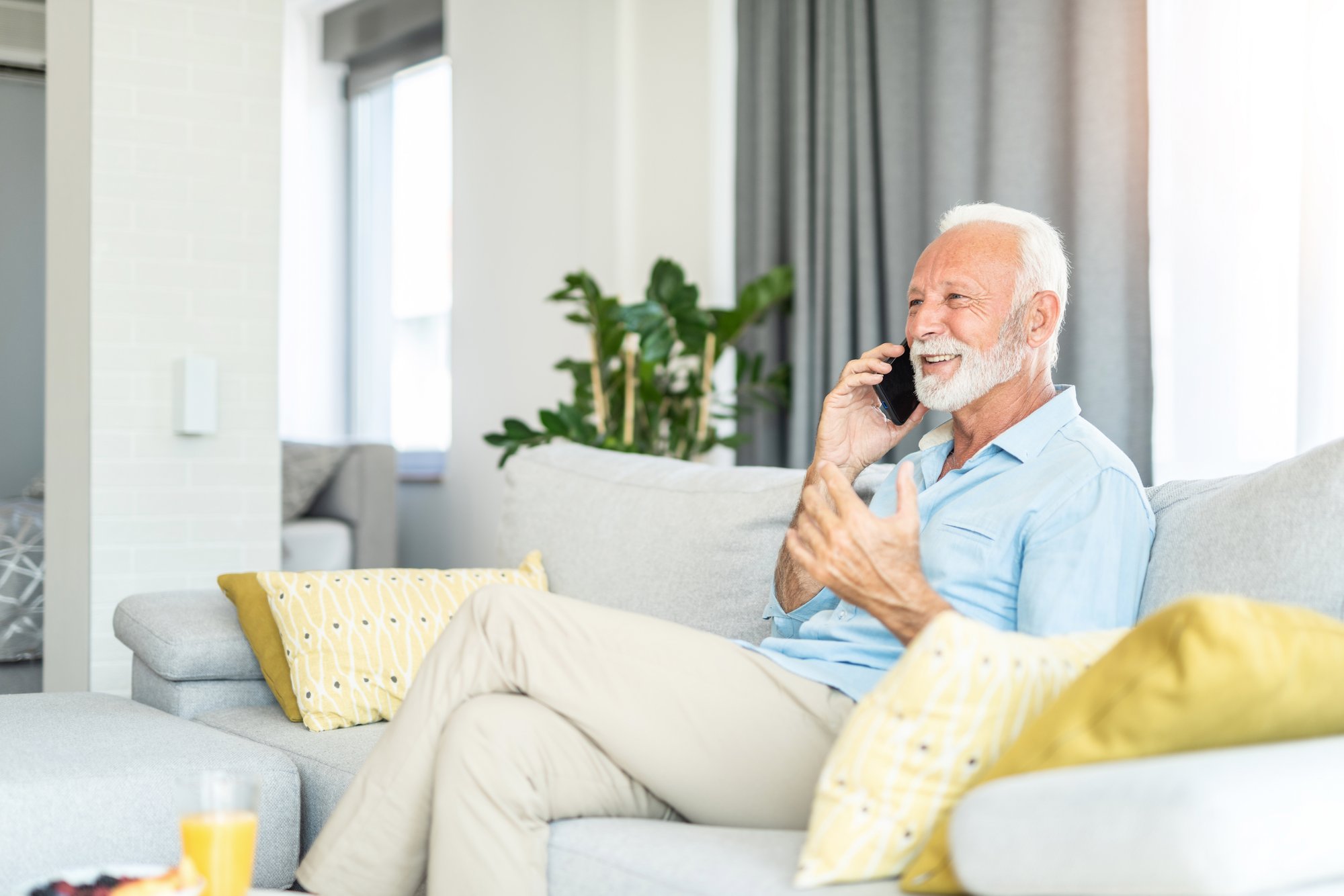 Man on phone smiling